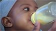 A baby being fed with a bottle